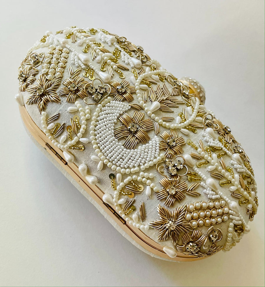 EMBROIDERED OVAL CLUTCH